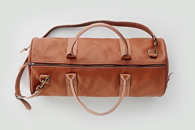 I Love Ugly Leather Duffle Bag in brown
|
<a
href="
http://store.timwebberdesign.com/collections/accessories/products/duffel-bag-leather" target="_blank"><u> $399 from Tim Webber Design</u></a>