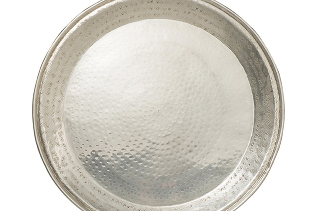 Gava round tray | $119 from <a
href="https://www.cittadesign.com/house-home/living-accessories/trays/gava-round-tray-hih0007" target="_blank"><u>cittadesign.com</u></a>.