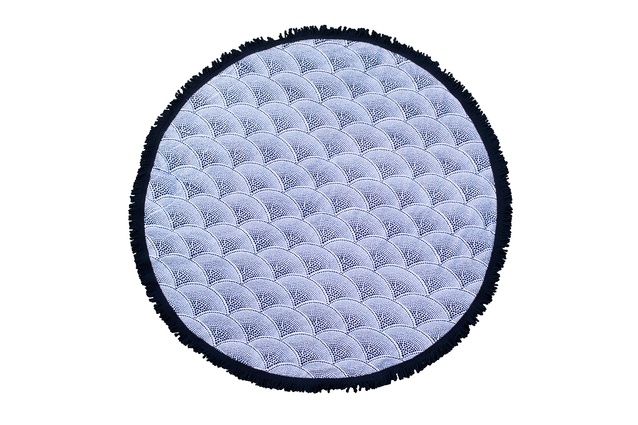 The Amaroo Roundie towel by Beach People | <a href="http://www.mildredandco.com/the-amaroo-roundie-towel.html" target="_blank"><u> $140 from Mildren&Co.</u></a>